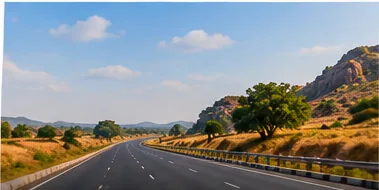 Open highway through green hills